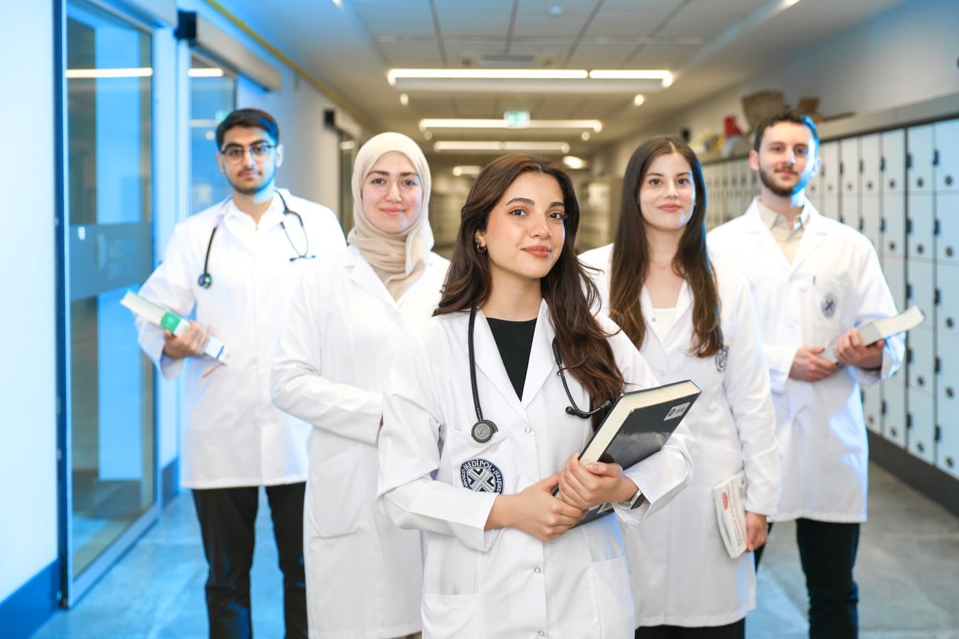 Medical students in a university corridor